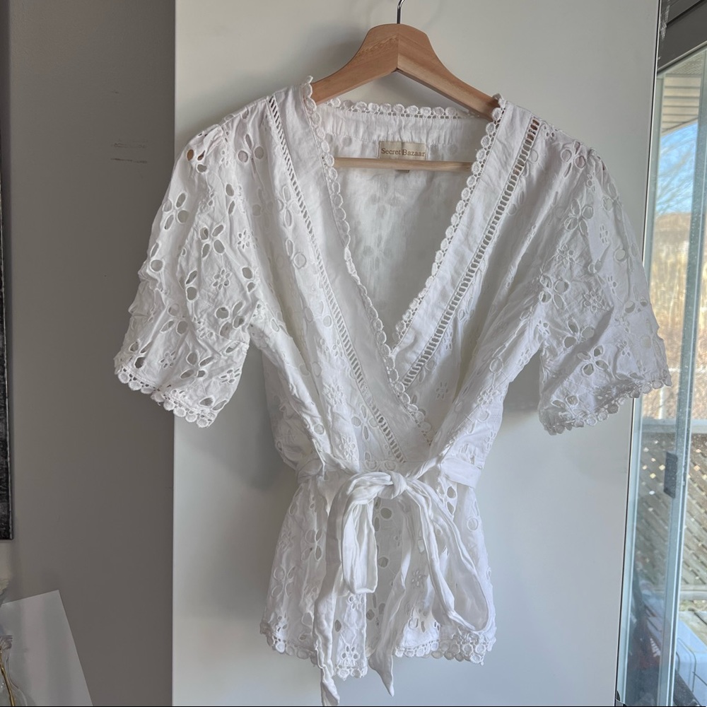 White eyelet wrap top